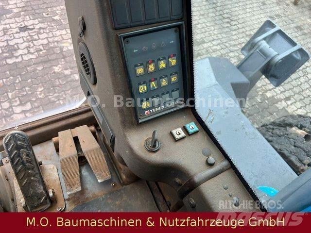 Fuchs MHL 350 حفارات بعجل