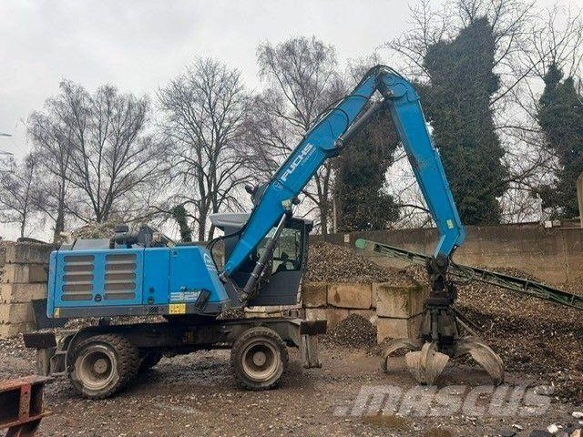 Fuchs MHL320 T4f حفارات بعجل