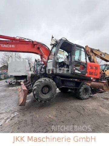 Hitachi ZX 140 W - 3 حفارات بعجل