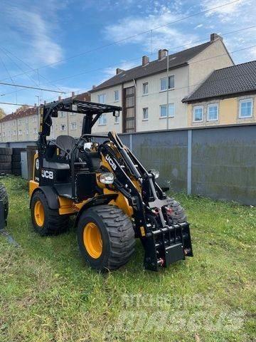 JCB 403 لوادر بعجل