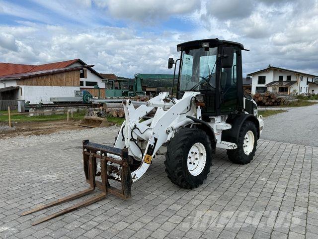 JCB 407 لوادر بعجل