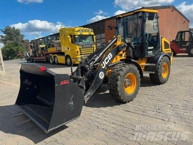JCB 409 لوادر بعجل
