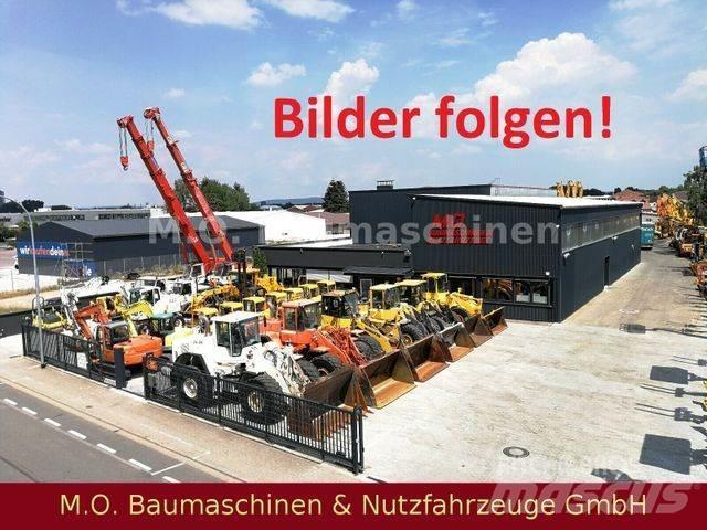 Liebherr L 514 لوادر بعجل
