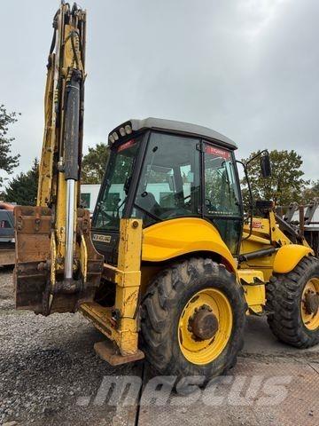 New Holland B 115 c لوادر ذات جرافات عكسية