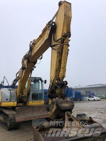 New Holland E 235 B حفارات زحافة