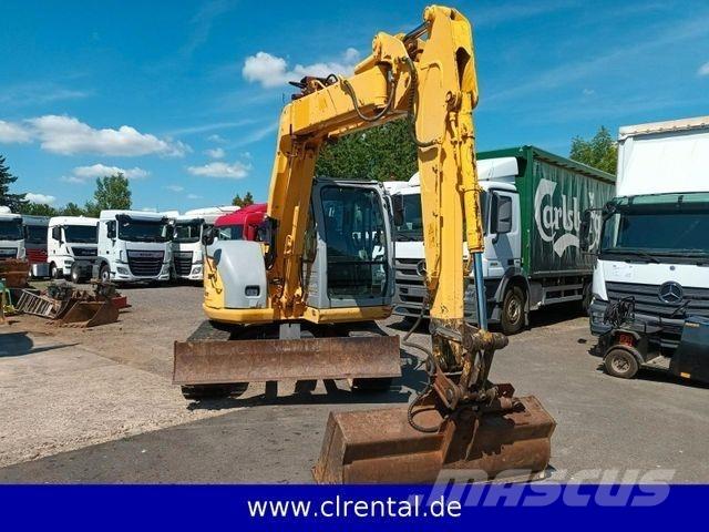 New Holland E70SR 4 لوادر ذات جرافات عكسية
