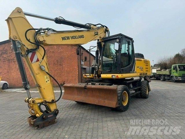 New Holland WE210 حفارات بعجل