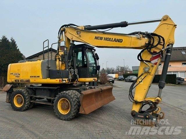 New Holland WE210 حفارات بعجل