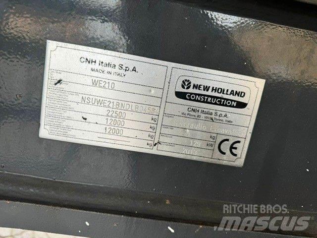 New Holland WE210 حفارات بعجل