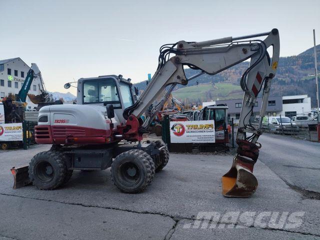 Takeuchi TB295W حفارات بعجل