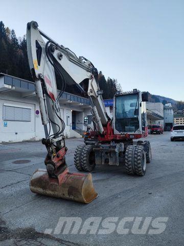 Takeuchi TB295W حفارات بعجل