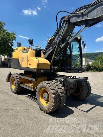 Volvo EW 140 D حفارات بعجل