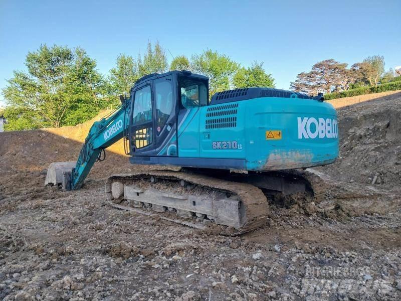 Kobelco SK210 حفارات زحافة