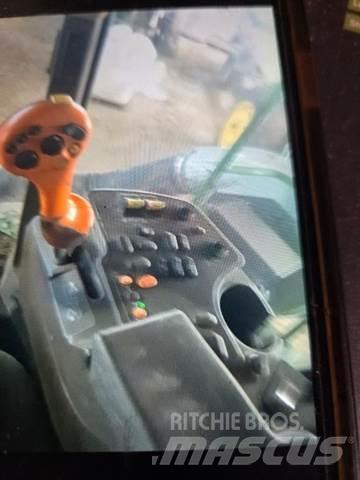 John Deere 9450 أخرى