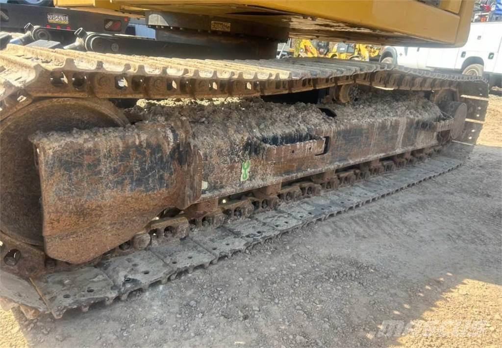 CAT 310 حفارات زحافة