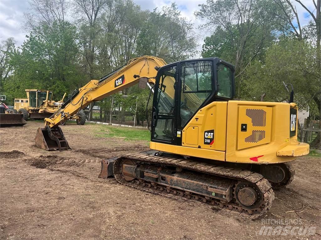 CAT 310 حفارات زحافة
