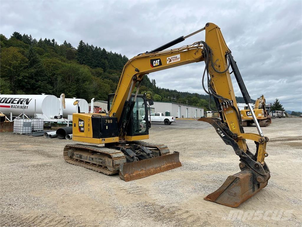 CAT 310 حفارات زحافة