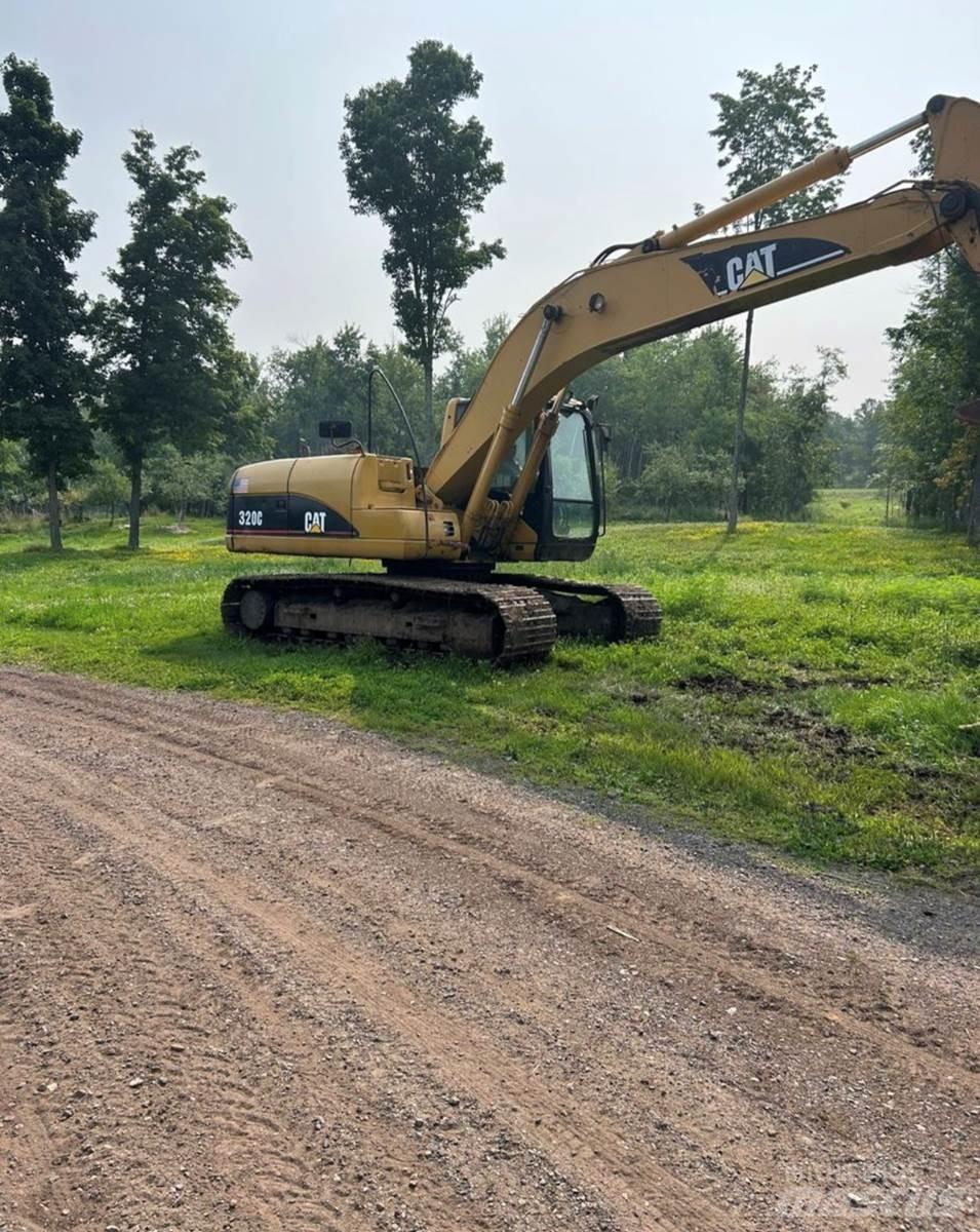 CAT 320C حفارات زحافة