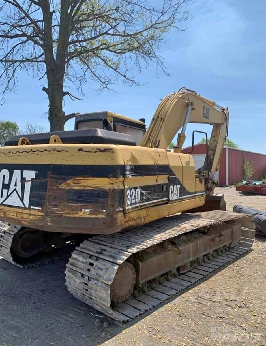 CAT 320L حفارات زحافة
