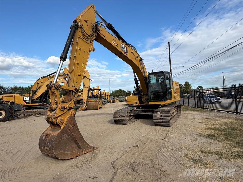 CAT 323 حفارات زحافة