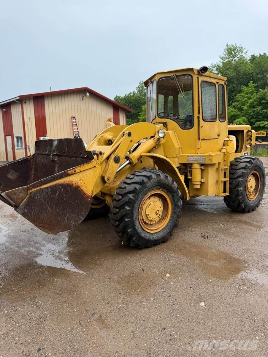 CAT 950 لوادر بعجل