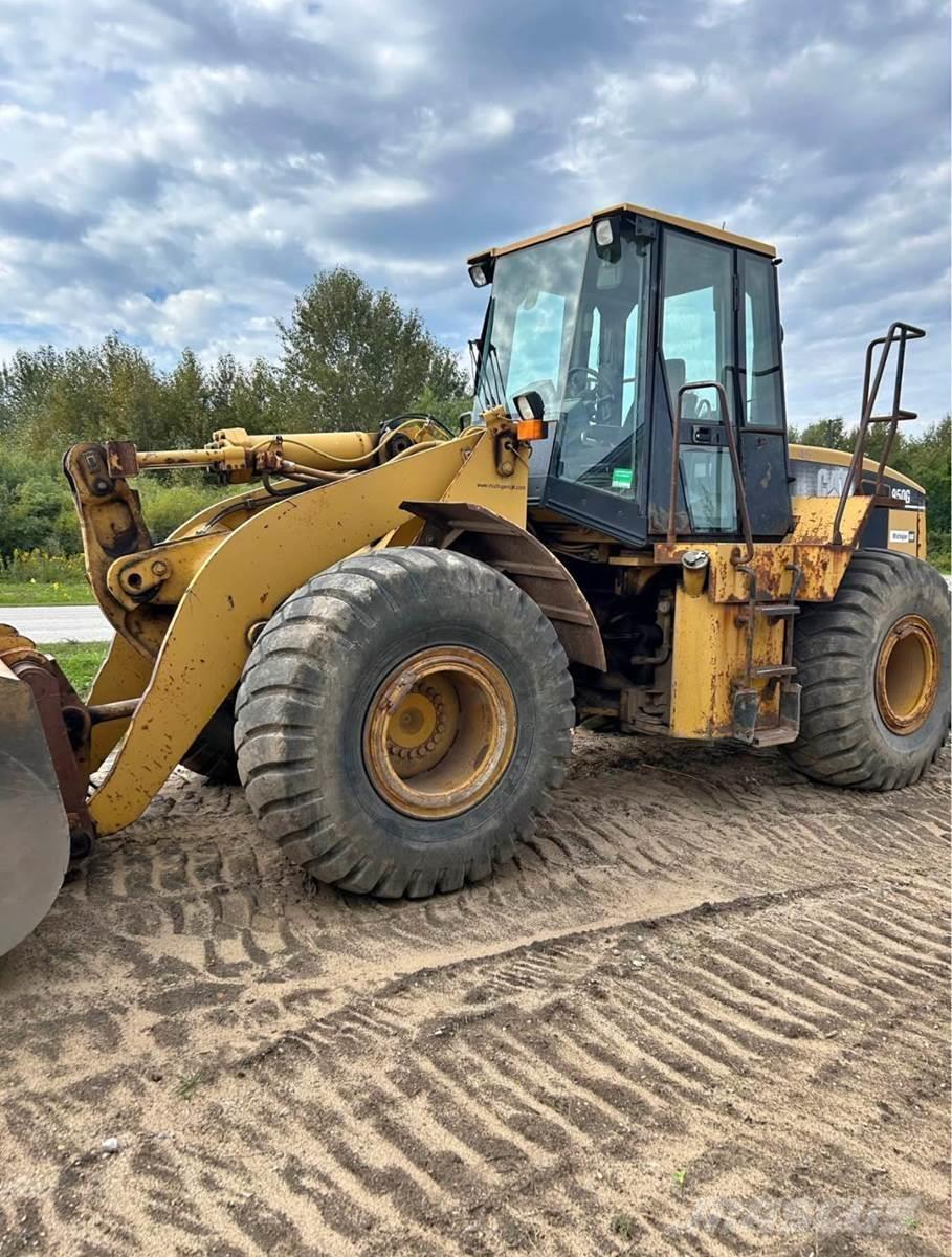 CAT 950 لوادر بعجل