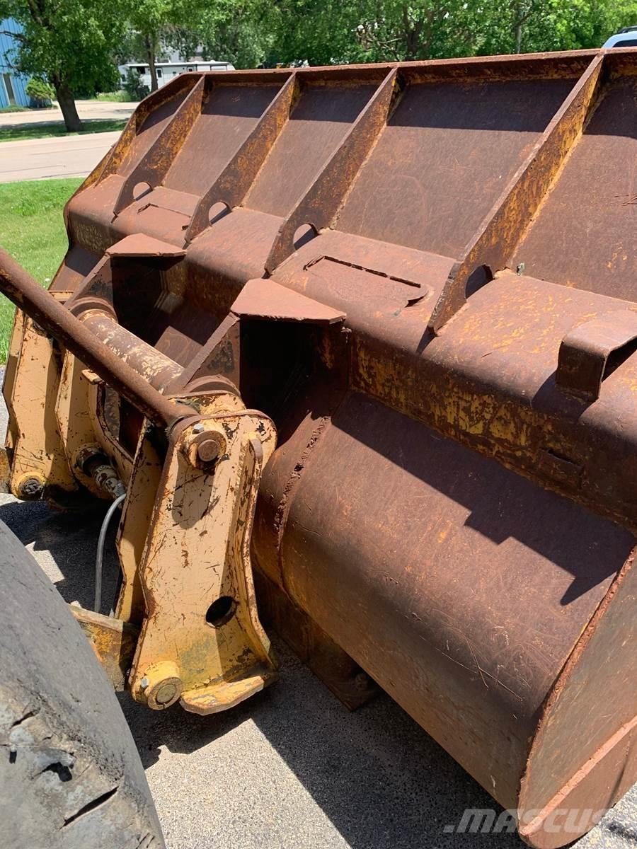 CAT 950 لوادر بعجل