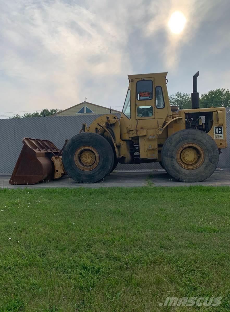 CAT 950 لوادر بعجل