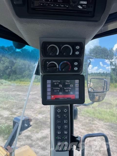 CAT 966M لوادر بعجل