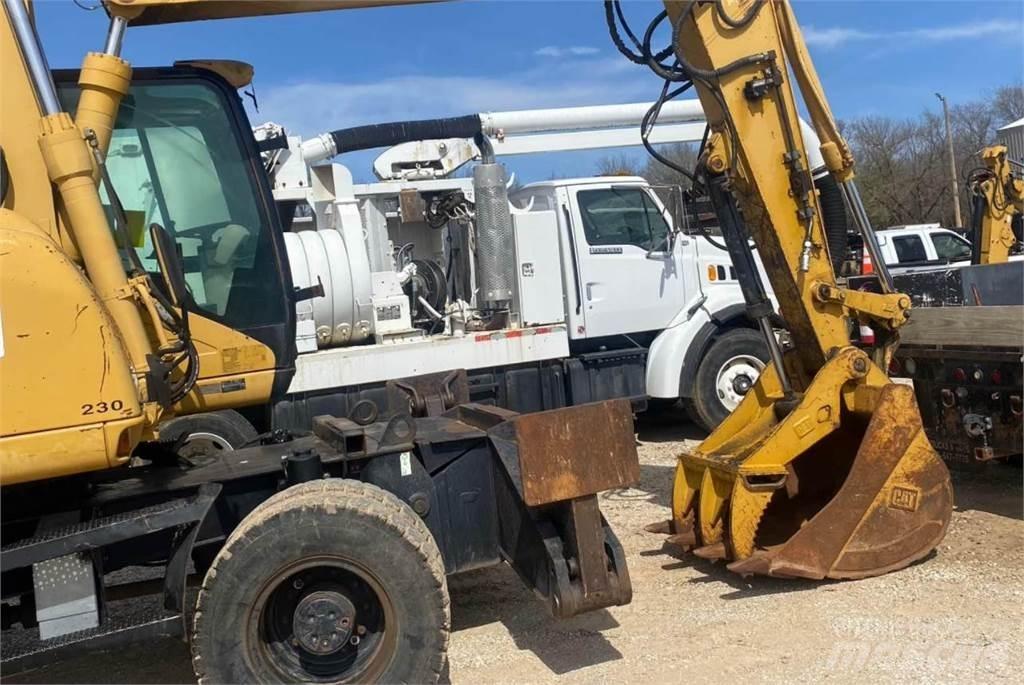 CAT M316C حفارات بعجل