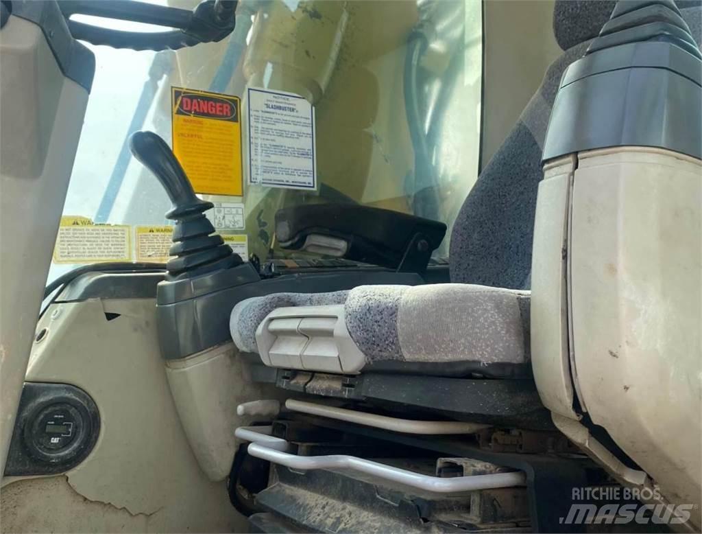CAT M316C حفارات بعجل