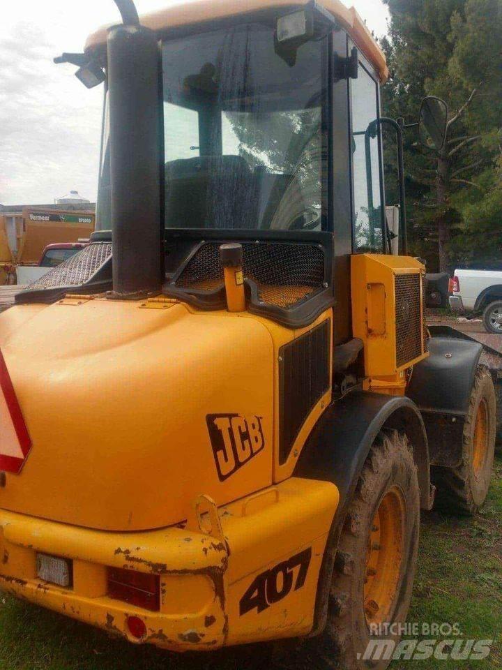 JCB 407 لوادر بعجل