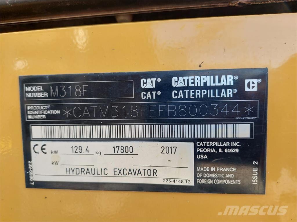 CAT M 318F حفارات بعجل