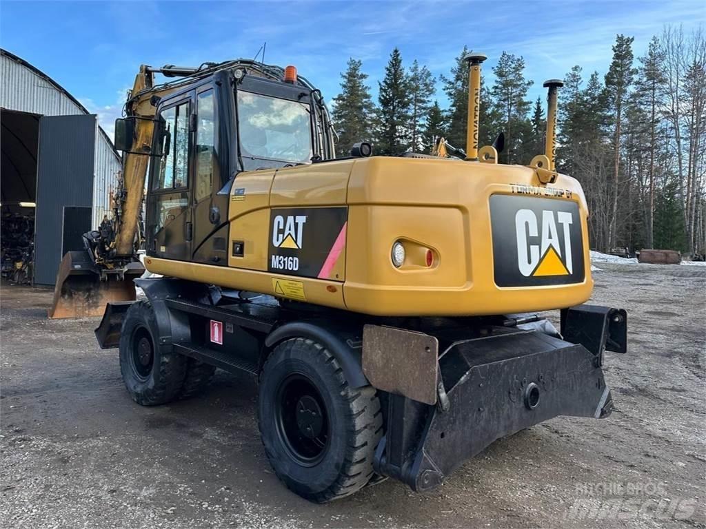 CAT M 316 D حفارات بعجل
