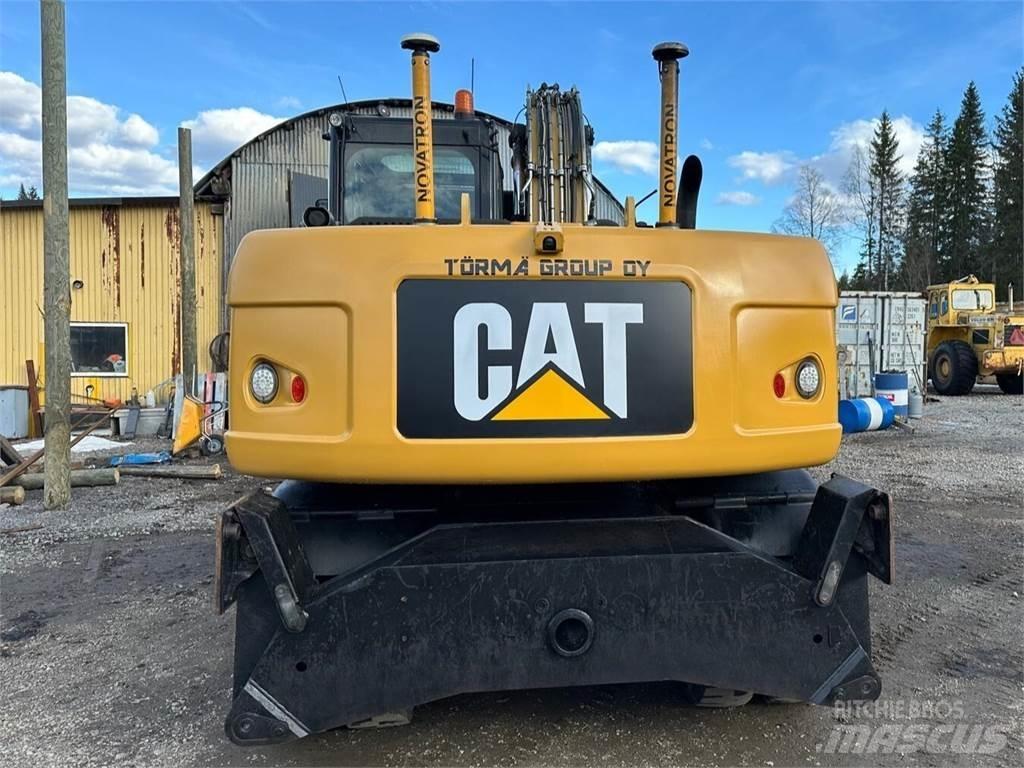 CAT M 316 D حفارات بعجل