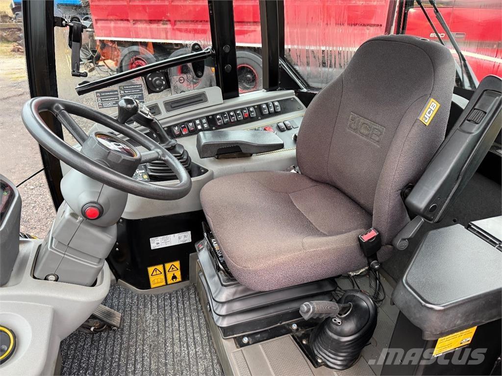 JCB 409 لوادر بعجل