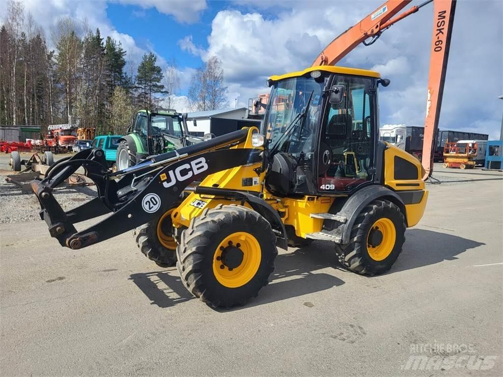 JCB 409 T4 لوادر بعجل