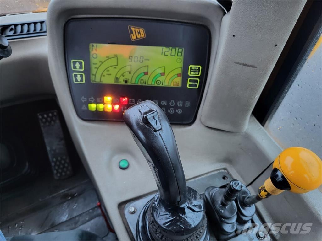 JCB 411B لوادر بعجل