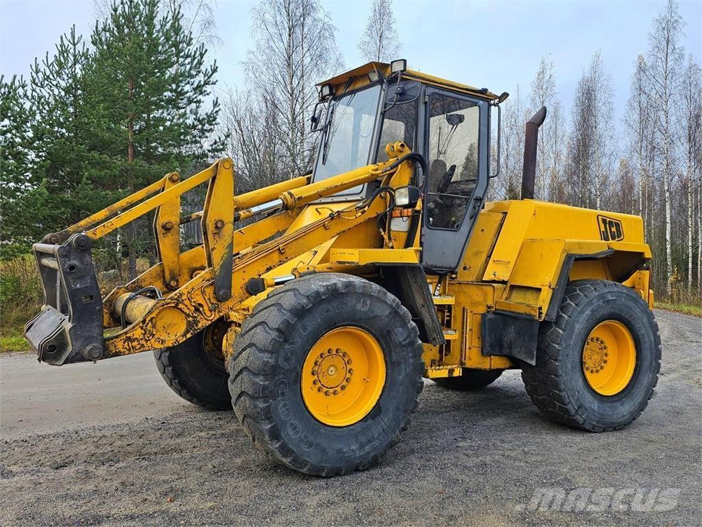 JCB 425 لوادر بعجل