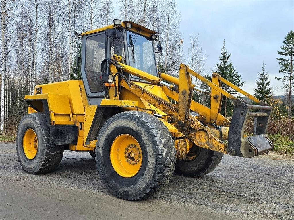 JCB 425 لوادر بعجل