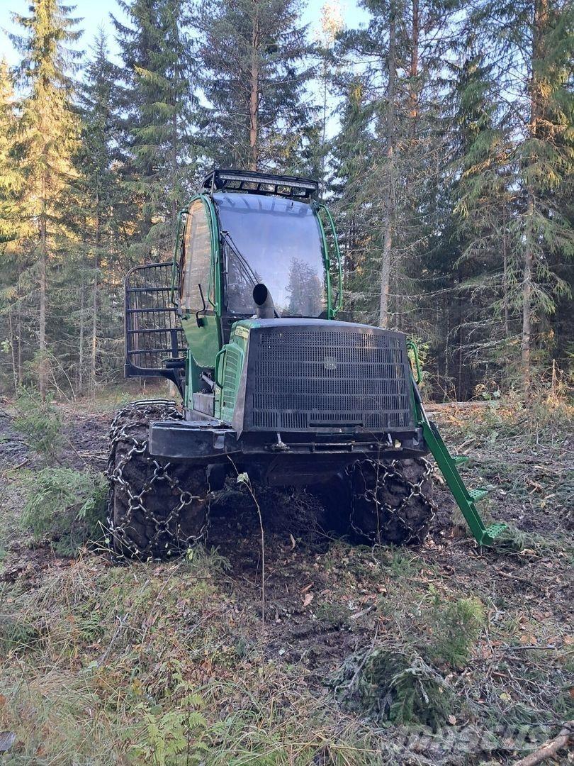 John Deere 1010e شاحنات