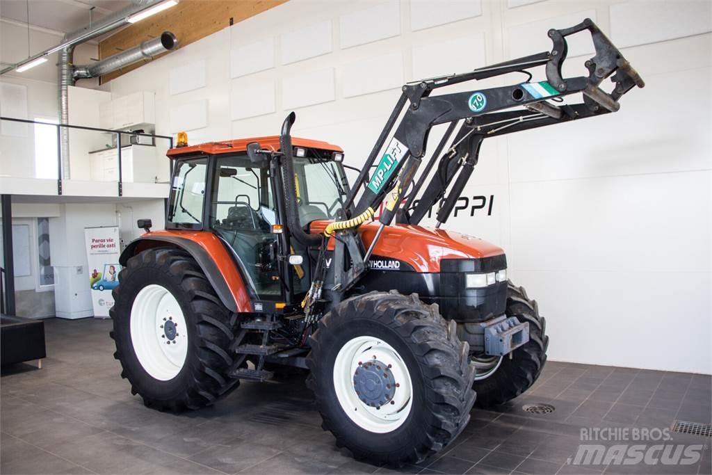 New Holland M135 الجرارات