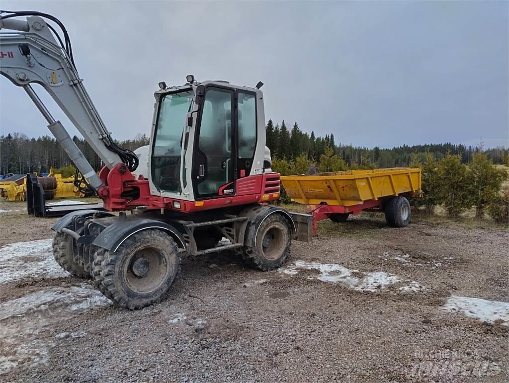 Takeuchi TB295W حفارات زحافة