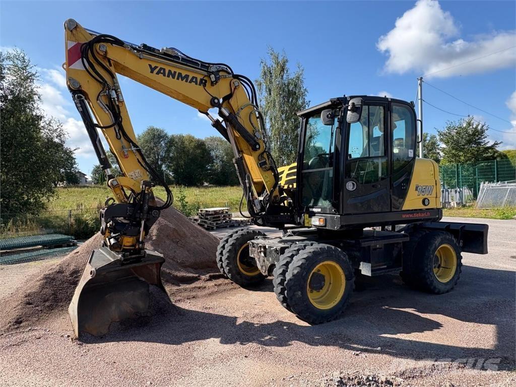 Yanmar B 95 W حفارات بعجل