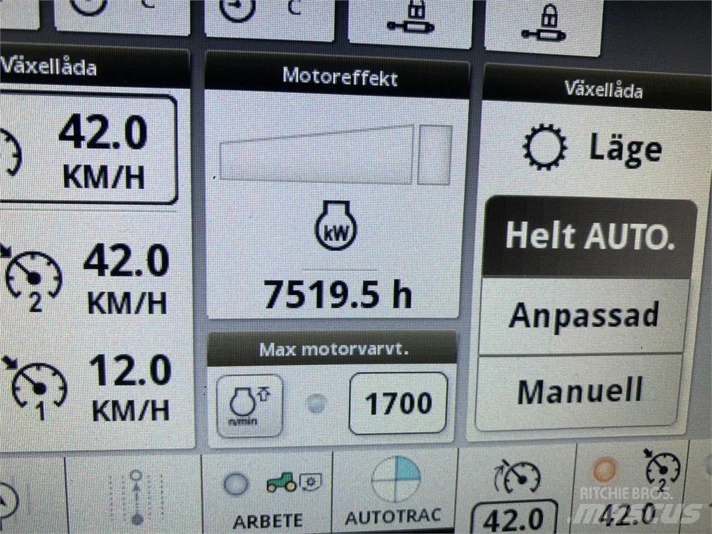 John Deere 6215R الجرارات