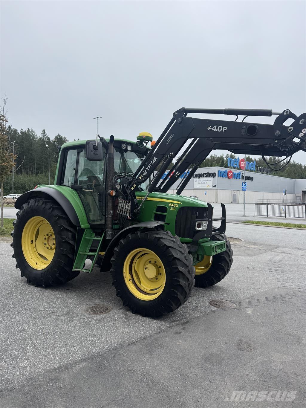John Deere 6430 Premium الجرارات