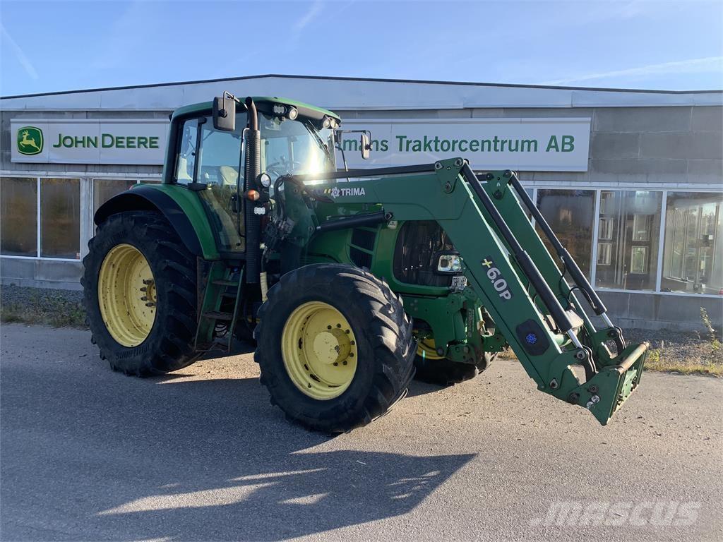 John Deere 7430 الجرارات