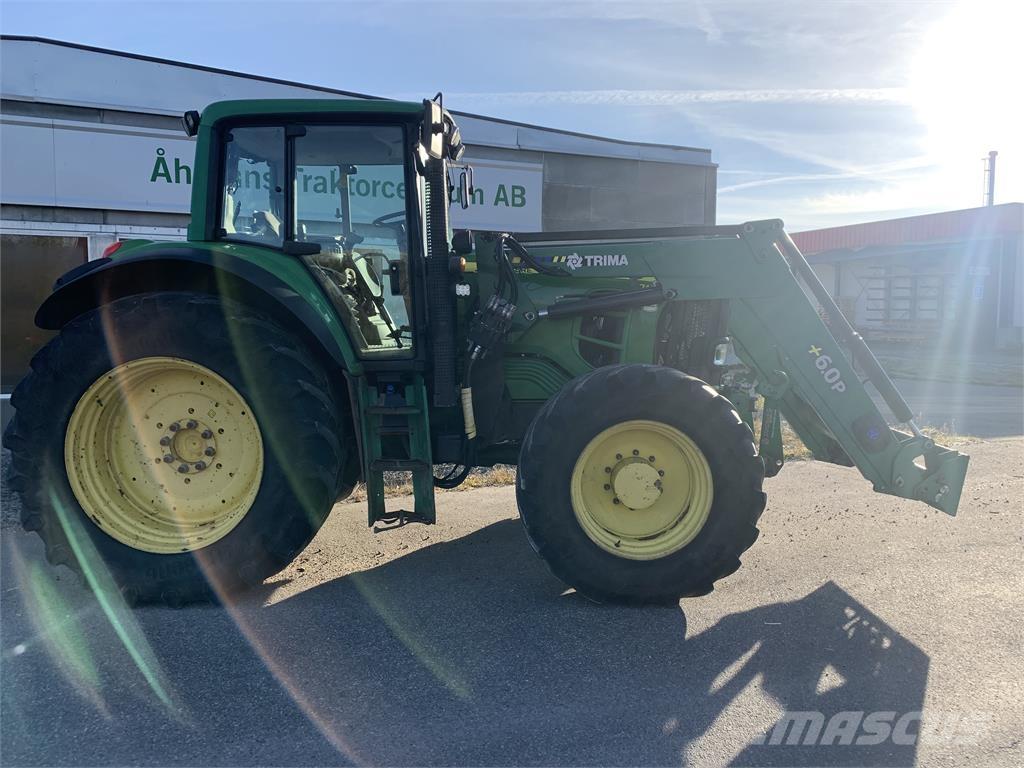 John Deere 7430 الجرارات