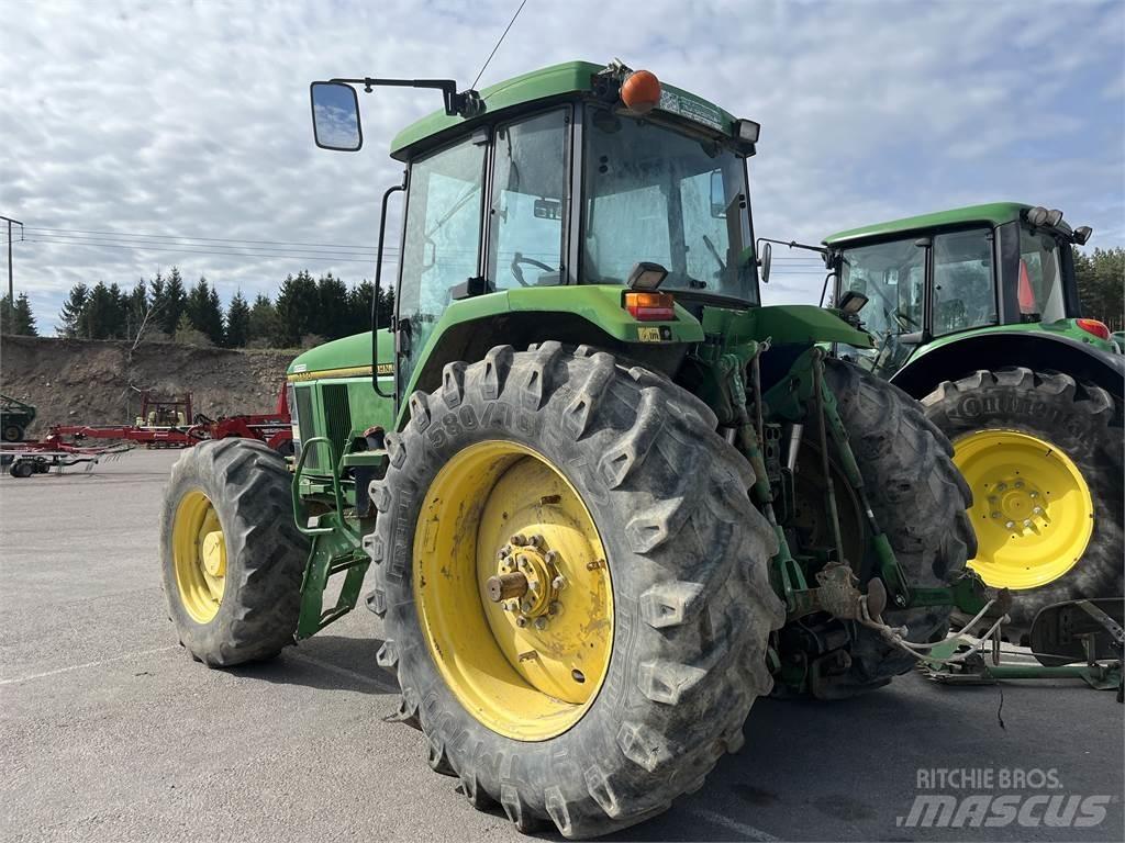 John Deere 7700 الجرارات