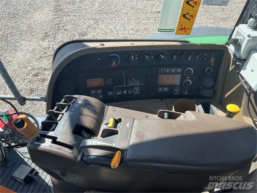 John Deere 7930 الجرارات